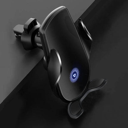 Automatic Wireless Car Phone Holder Air Vent Mount securely clipped to vent with Qi charging LED, one-handed auto-grip for maps and calls