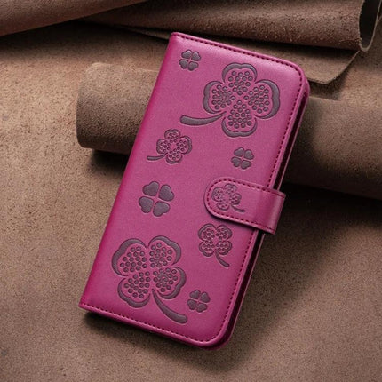 Four Leaf Embossed Leather Wallet Case For IPhone 15 Pro Max in pink PU leather with wallet slots, magnetic clasp and cutouts for ports and buttons