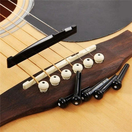 Essential Guitar Accessory Set for Daily Home Music Practice with replacement bridge pins, strings and picks in organizer