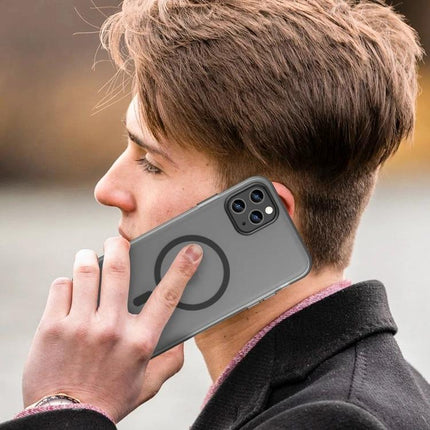 iPhone Case For Everyday Use - matte translucent TPU protective case with PC lens frame shown on a person holding iPhone while commuting