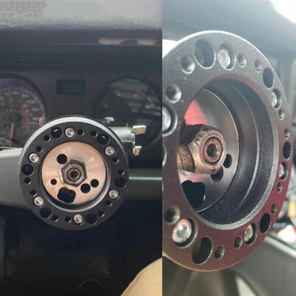 Universal Steering Wheel Hub Adapter Kit For Aftermarket Install Black installed on vehicle steering column showing aluminum alloy hub adapter