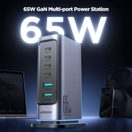 JOYROOM Multi-Port Charger for Daily Home and Travel Use shown charging a laptop, phone and tablet with 65W GaN multi-port power station