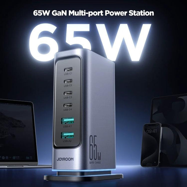 JOYROOM Multi-Port Charger for Daily Home and Travel Use shown charging a laptop, phone and tablet with 65W GaN multi-port power station