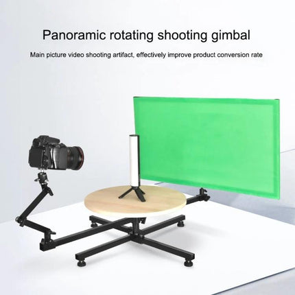 YELANGU Panoramic Turntable for 360-Degree Photography Sessions on studio table with camera arm and green screen backdrop