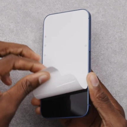 Plastic Screen Protectors for Everyday iPhone Daily Use being applied to an iPhone to guard against scratches and maintain screen clarity