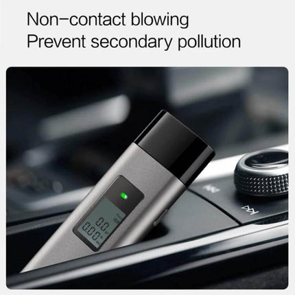 Xiaomi Youpin Lydsto T1 Portable Alcohol Tester for Daily Use showing non-contact blowing, aluminum alloy body and clear LCD reading in a car
