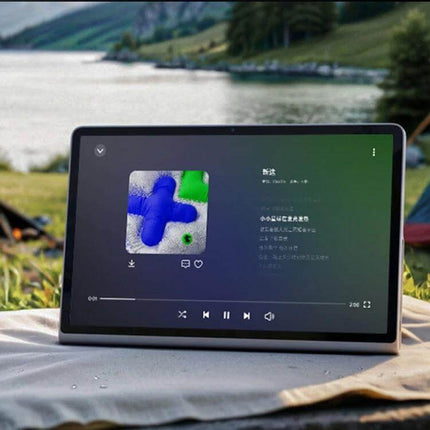Lenovo Xiaoxin Pad Studio 11.5-Inch WiFi Tablet with 8GB Memory showing music player screen outdoors by a lake, 11.5-inch display