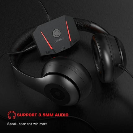 GameSir VX2 AimBox for Everyday Console Gaming Setup - compact adapter with 3.5mm audio and headphones on black surface