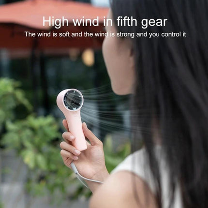 Portable Mini Handheld Fan with Digital Speed Display for Daily Use - compact pink fan with lanyard shown in use on high fifth gear breeze