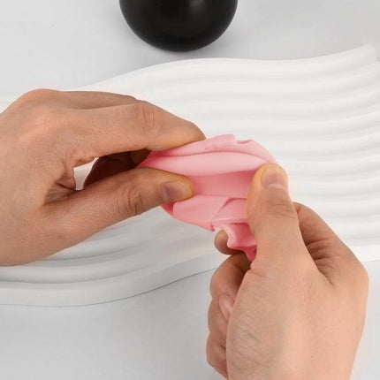 Silicone Protective Case for Samsung Earbuds in Daily Use showing flexible pink silicone being stretched by hands