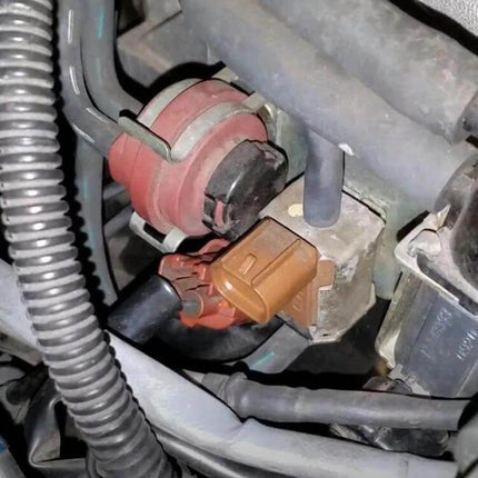 Car Vacuum Solenoid Valve For Dodge And Chrysler Idle Control installed in engine bay, PPS+metal idle control solenoid regulating vacuum and idle speed