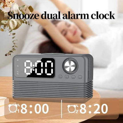 Bedside Speaker With LED Clock And Wireless Charging Pad showing digital alarm clock display and snooze feature