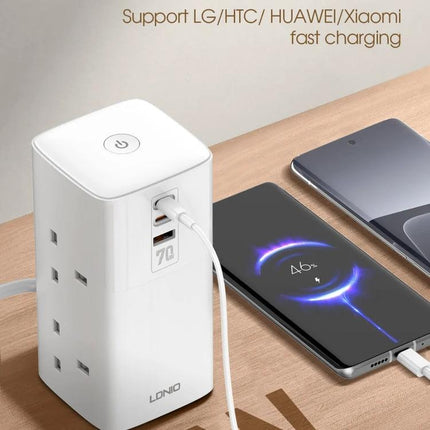 LDNIO 70W Multi-Function Desktop Charger for Devices powering smartphone tablet and laptop on a wooden desk