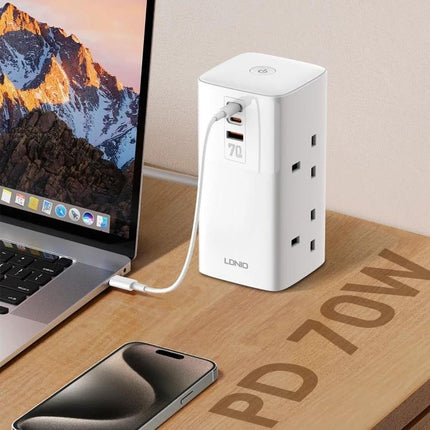 LDNIO 70W Multi-Function Desktop Charger for Devices powering laptop tablet and smartphone on a desk with PD 70W label