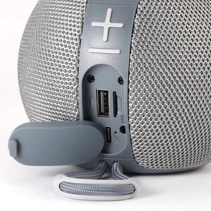 TG Portable Wireless Speaker For Outdoor Gatherings And Relaxation showing USB, TF card slot, USB-C port and volume controls on gray speaker
