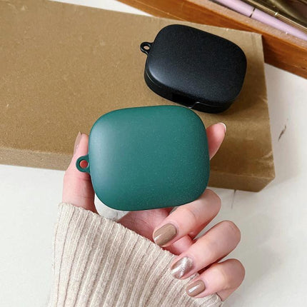 Essential Protective Case for Daily Earphone Travel shown in green and black compact travel protective earphone case
