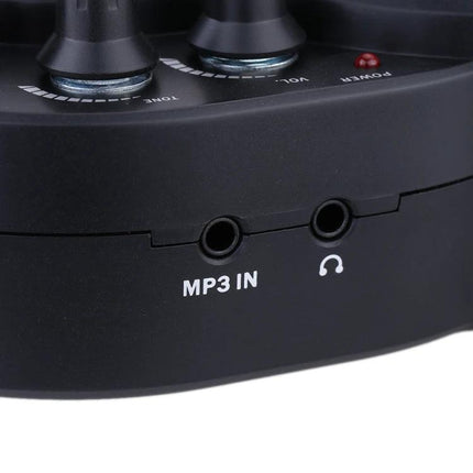 JOYO Mini Guitar Amplifier for Home Practice Sessions close-up showing MP3 IN and headphone jack with tone and volume knobs