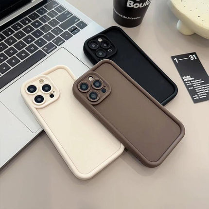 Phone Case For Everyday iPhone Protection And Comfortable Daily Use Lightweight Everyday Handling - minimalist TPU cases in cream brown and black on desk