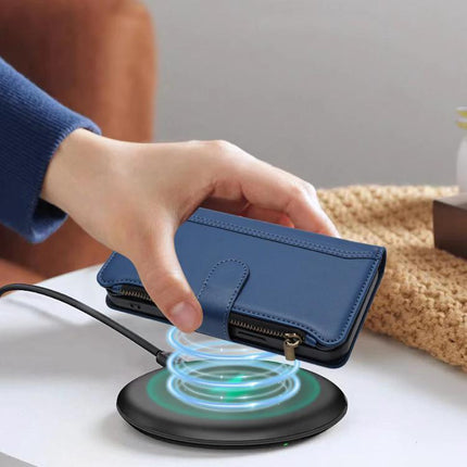 Magnetic Closure Leather 9 Card Slots With Hand Strap For Samsung Galaxy S26 5G - blue wallet case on wireless charger, hand holding case