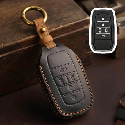 Cowhide Key Cover For Toyota Sienna Four To Six Button - brown stitched leather key fob cover with brass ring protecting Toyota 4-6 button key