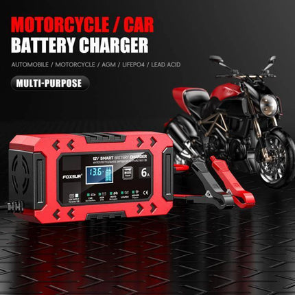 Car And Motorcycle Battery Charger With Worldwide Plugs compact red 12V charger with clamps shown next to motorcycle for charging, maintaining and desulfating batteries