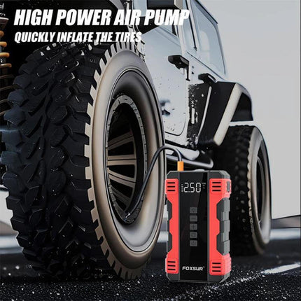 FOXSUR Portable Emergency Car Starter with Air Pump next to SUV tire showing digital gauge and inflator hose