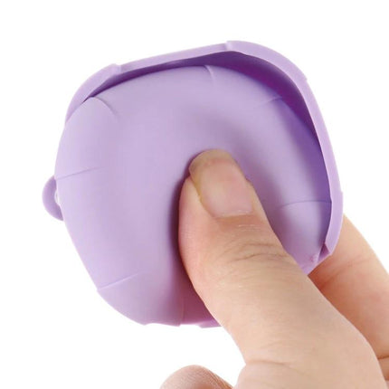 Samsung Galaxy Buds Live Silicone Case for Everyday Protection soft purple silicone case shown compressed by thumb for shock absorption and easy grip