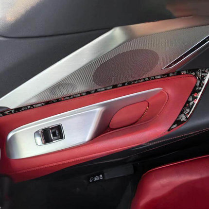 Gold Foil Carbon Fiber Door Sticker For Chevrolet Corvette installed on red interior door panel showcasing textured gold foil carbon fiber trim