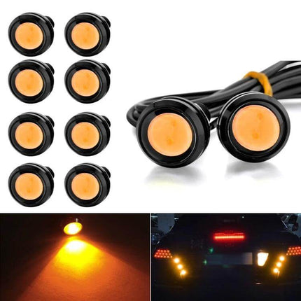 Hawkeye 23mm Motorcycle LED Light, Double Lens White compact yellow turn signal LED module shown mounted and illuminated