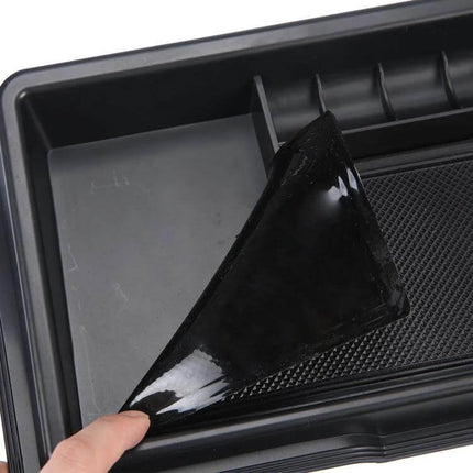 Dashboard Storage Box For Suzuki Jimny Keeps Essentials Handy - close-up of black non-slip liner being peeled in custom-fit dashboard organizer