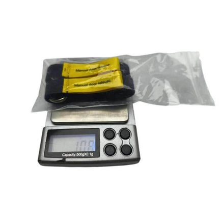 Tesla Model Y Rear Door Emergency Pull Rope Set Of Two high-visibility yellow handles shown on a scale for weight