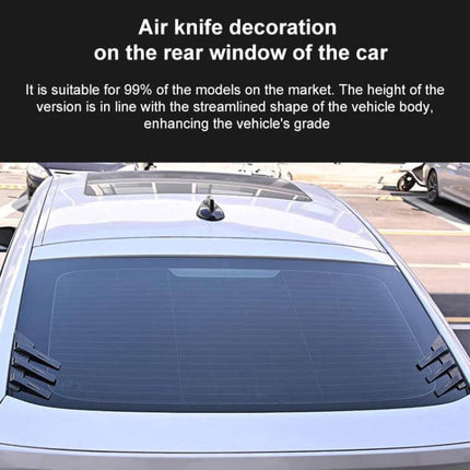Pair of Car Rear Windshield Shark Fin Decorative Stickers in Bright Black - rear windshield view on silver car showing black shark fin decals