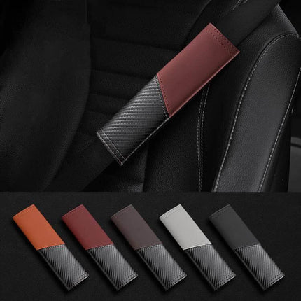 Car Leather Seat Belt Shoulder Guard Carbon Fiber Stitching on black car seat showing brown and carbon fiber design options