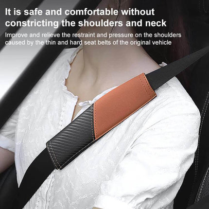 Car Leather Seat Belt Shoulder Guard Carbon Fiber Stitching on a black seatbelt worn by a passenger, brown leather and carbon fiber look pad for comfort