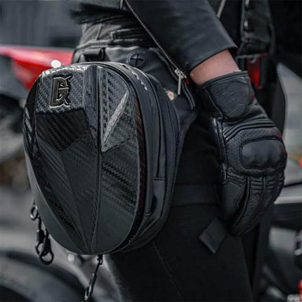Ghost Racing Water Repellent Motorcycle Leg Bag For Daily Rides - black carbon-look leg bag worn by rider, water-repellent 600D Oxford compact storage
