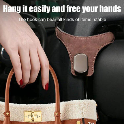 Car Seat Back Hanger Hook For Backseat Storage Organizer hanging a leather bag from a brown PU hook on car seat back to keep interior organized