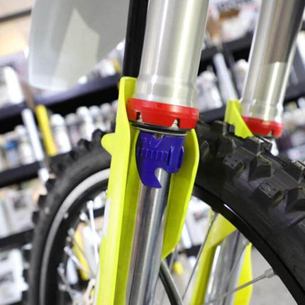 Motorcycle Fork Seal Cleaner For 45 to 55mm Forks Easy Cleaning attached to a fork removing dirt for quick on-tool maintenance