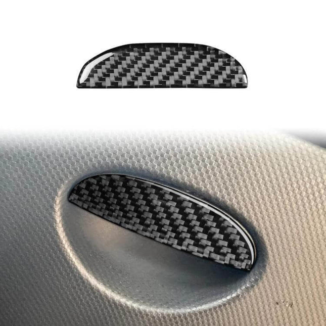 Carbon Fiber Car Seat Storage Box Handle Decorative Sticker installed on SEAT Leon seat showing carbon fiber texture and protective finish