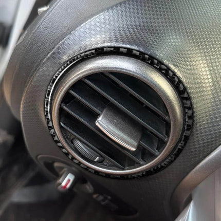 Carbon Fiber Car Air Outlet Decorative Sticker Left And Right fitted on SEAT Leon round air vent, realistic carbon fiber weave, left and right set, self-adhesive