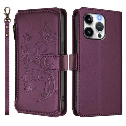 Leather Wallet Phone Case With Card Storage in purple PU leather with embossed floral design, zipper pocket and wrist strap