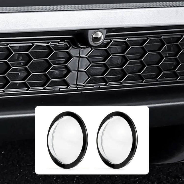 Lens Guard Protective Cover Kits for Tesla Vehicles shown installed over front camera lens on Tesla grille, precise fit for Cybertruck and Model S (front view)