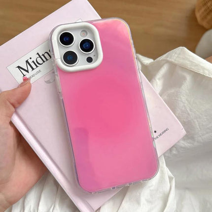 Colorful Phone Case With Candy Gradient For Everyday iPhone Protection showing pink gradient slim protective iPhone case held over a book