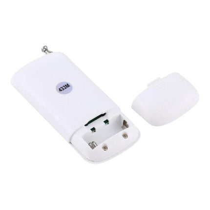 Wireless Remote Control Socket for Home Device Management - white remote with 433MHz label and open battery compartment