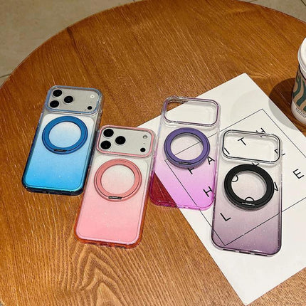 Transparent Gradient iPhone Case For Everyday Handling showing blue, pink and purple gradient clear cases with ring holders on a wooden table