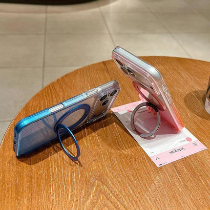 Transparent Gradient iPhone Case For Everyday Handling two iPhones on wooden table with ring stands showing blue and pink gradient clear protective cases