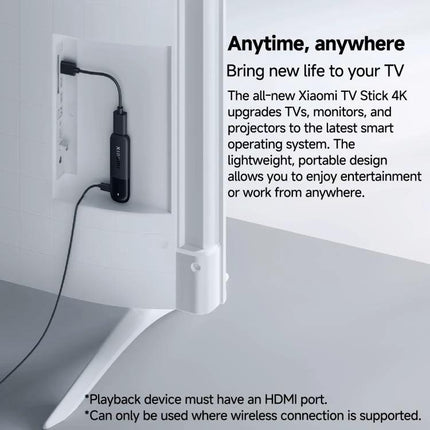 Xiaomi 4K Ultra HD TV Stick for Streaming Video Content at Home plugged into TV HDMI showing compact streaming upgrade with Google TV interface