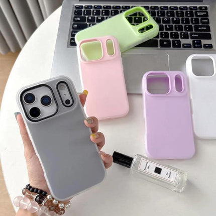 Daily Protective Case For iPhone Slim Design - slim pastel protective iPhone cases displayed on laptop and held in hand