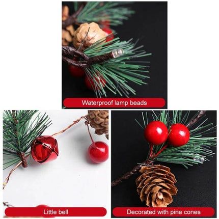 Christmas Pine Needles Light String 2m Warm White Indoor - close up of LED on flexible copper wire with pine needles, pine cone and red berry decor