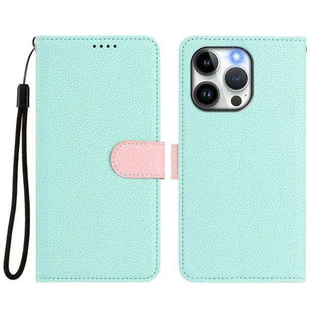 Vegan Leather Phone Case With Detachable Wallet For Everyday Use in mint green with pink clasp, wrist strap and built-in stand for hands-free use