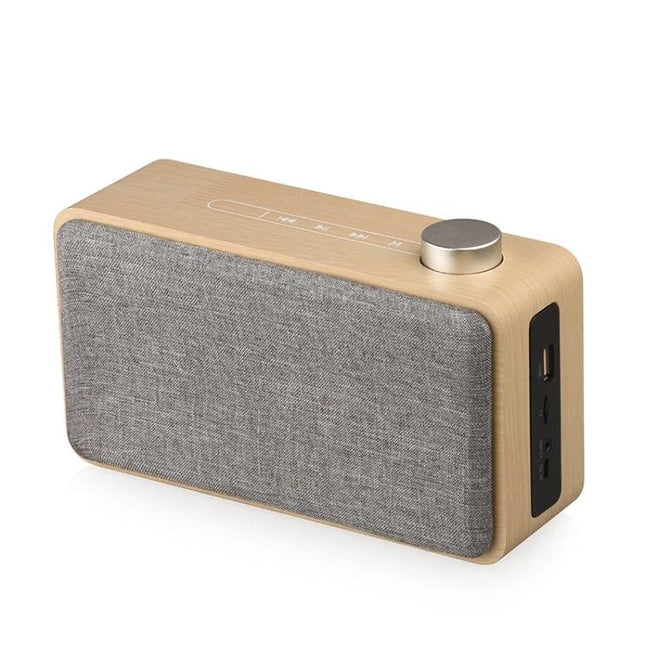 Compact Bluetooth Speaker For Home And Travel With Portable Design with metal knob, touch controls, fabric front and side ports